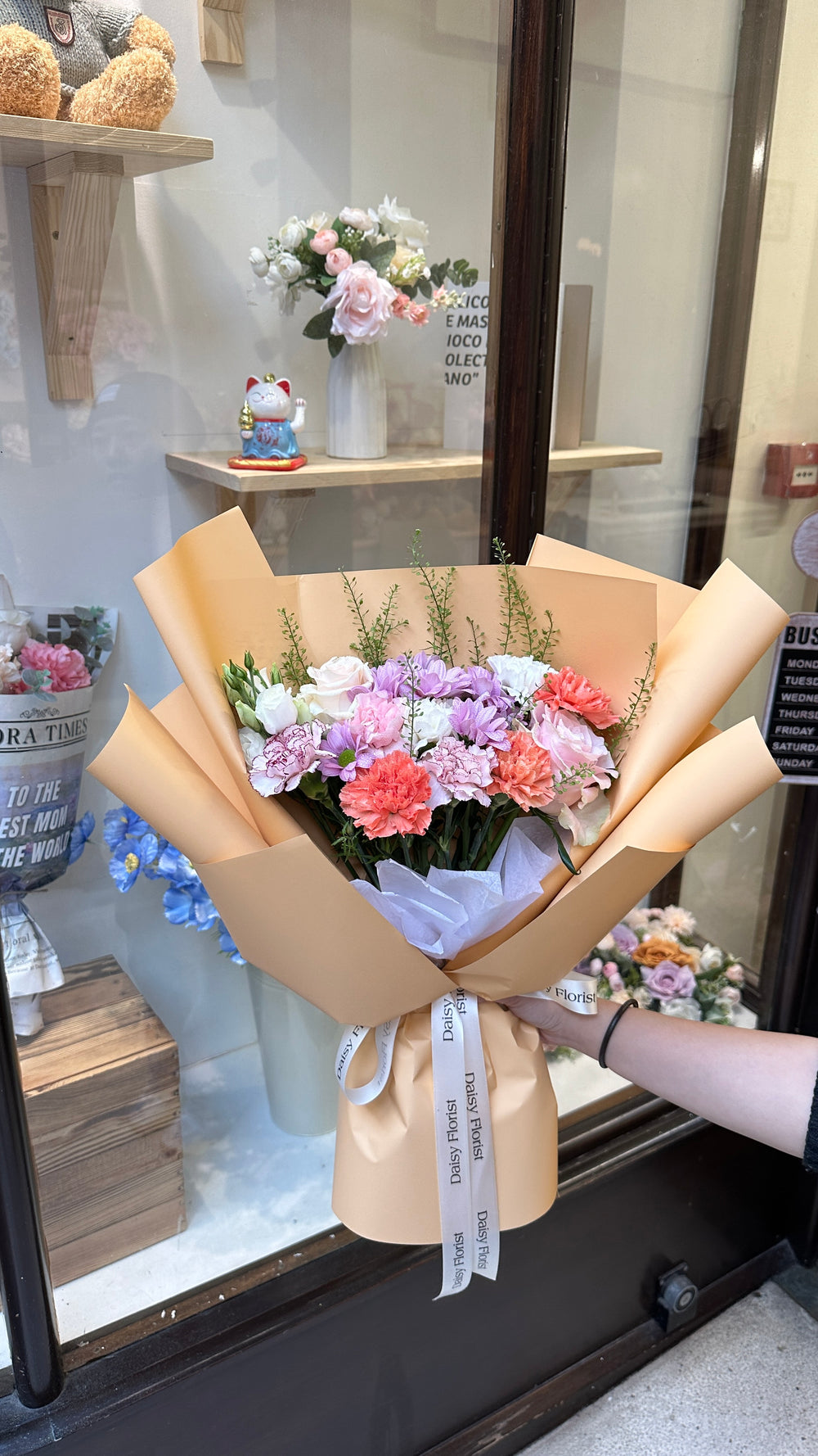 Mixed Bouquet: Bright Flowers in Orange Wrapping | Daisy Florist