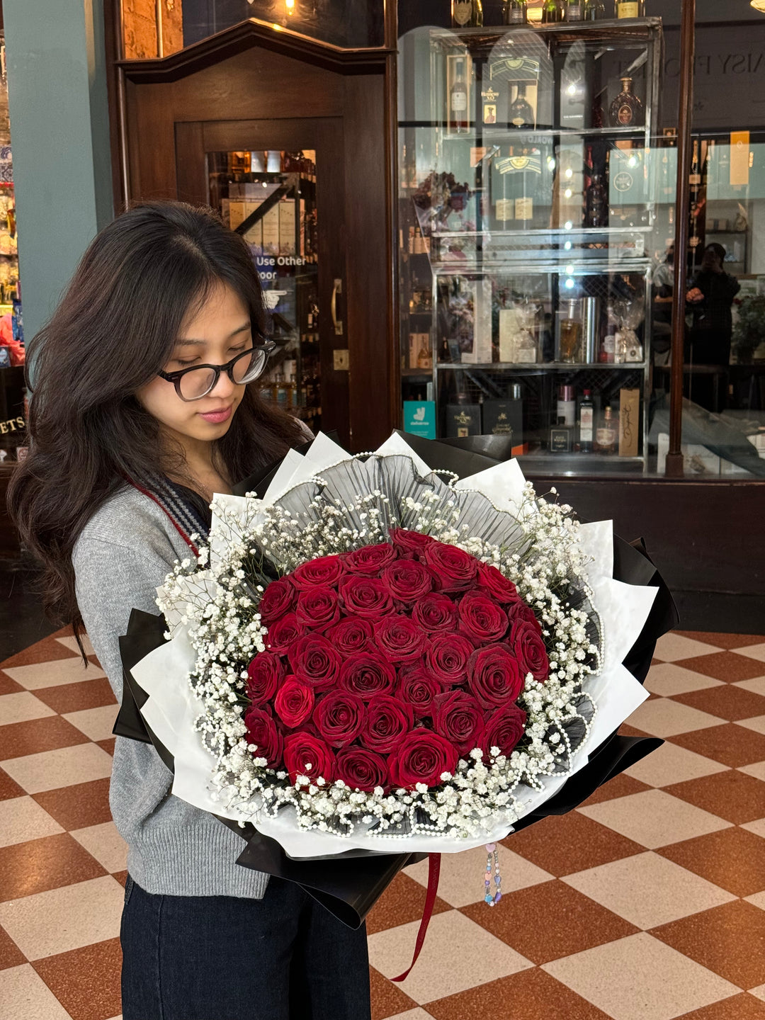 Bouquet of Red Roses with White Baby’s Breath