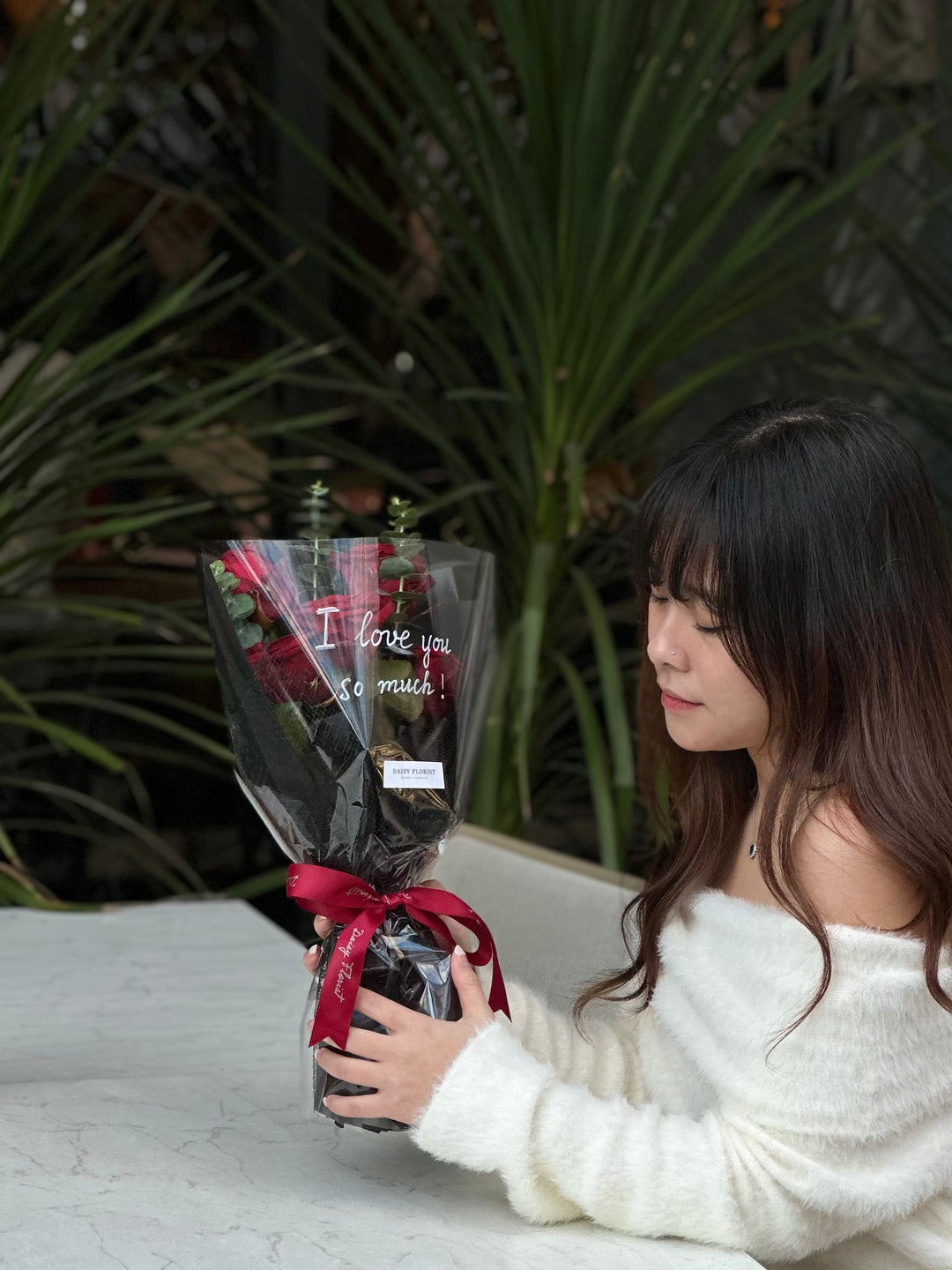 Crimson Kiss Cluster: Red Roses with Foliage | Daisy Florist