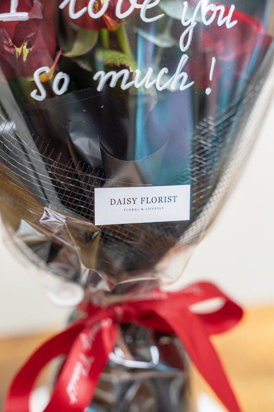 Crimson Kiss Cluster: Red Roses with Foliage | Daisy Florist